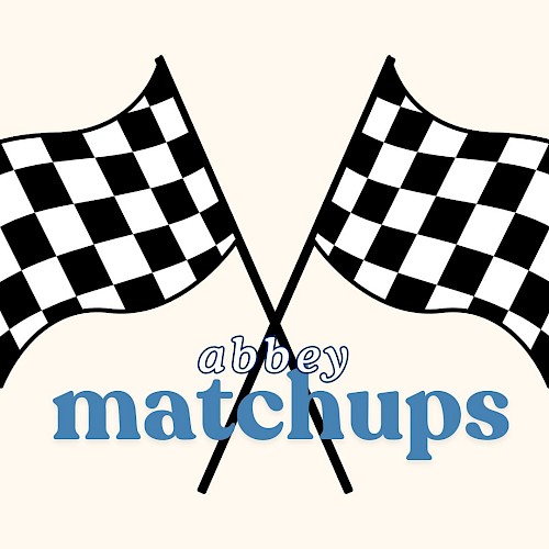 This image features two black and white checkered racing flags crossed with the text 