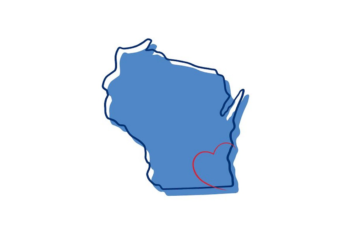 The image shows an outline of Wisconsin in blue with a small red heart located in the southeastern region within the outline.